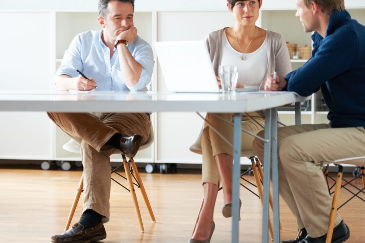 Entrevistacweff Man, tired and bored in meeting at office, workplace or people planning with notes and documents. Team, discussion and manager with fatigue, burnout or exhausted at work with staff in conference room.