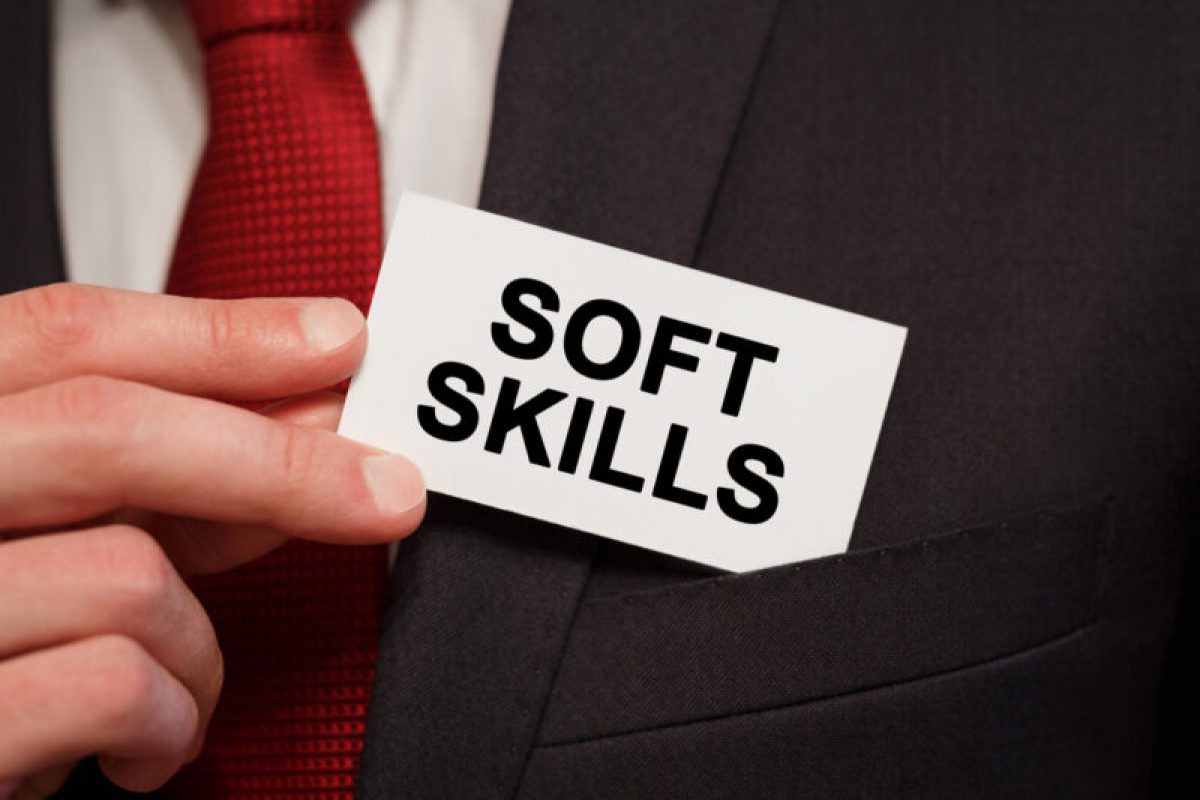 Businessman putting a card with text Soft Skills in the pocket Businessman putting a card with text Soft Skills in the pocket
