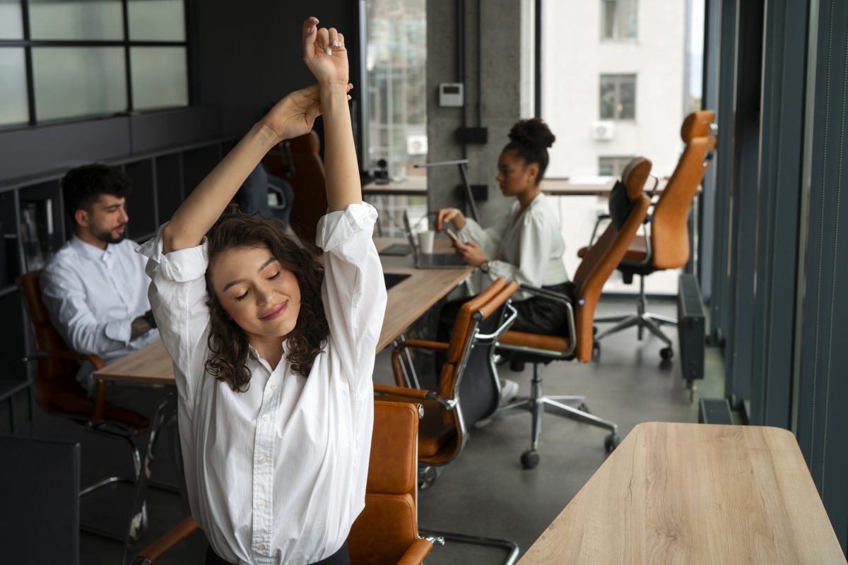 medium-shot-woman-stretching-work medium-shot-woman-stretching-work