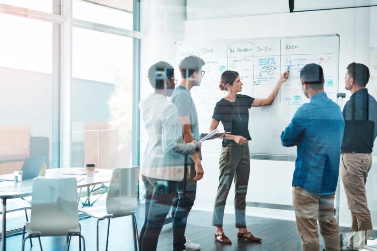 Decision making is better when you do it together Shot of a group of businesspeople having a meeting in a modern office